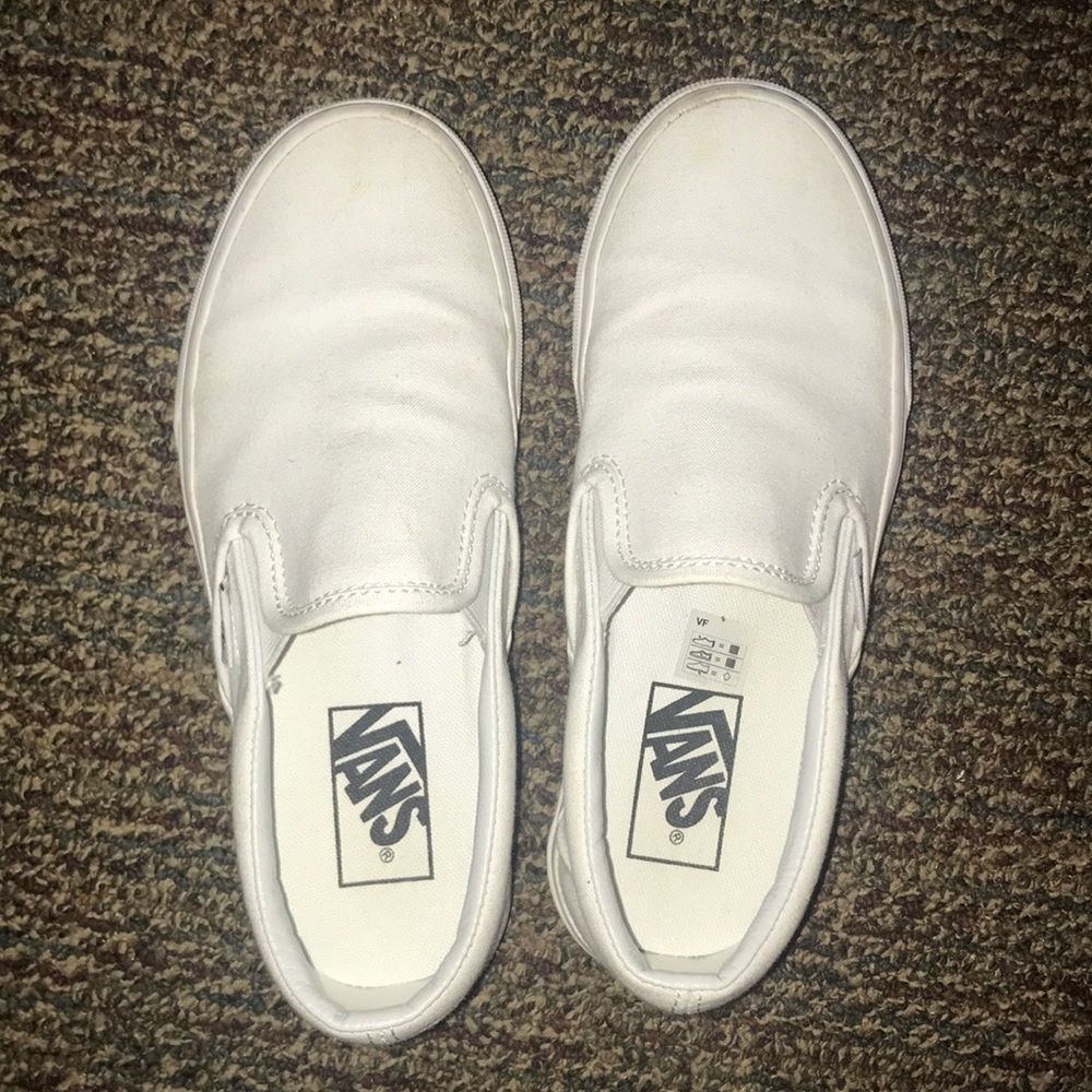 Vans white slip-ons